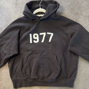 Essentials Black Hoodie with White 1977 Graphic